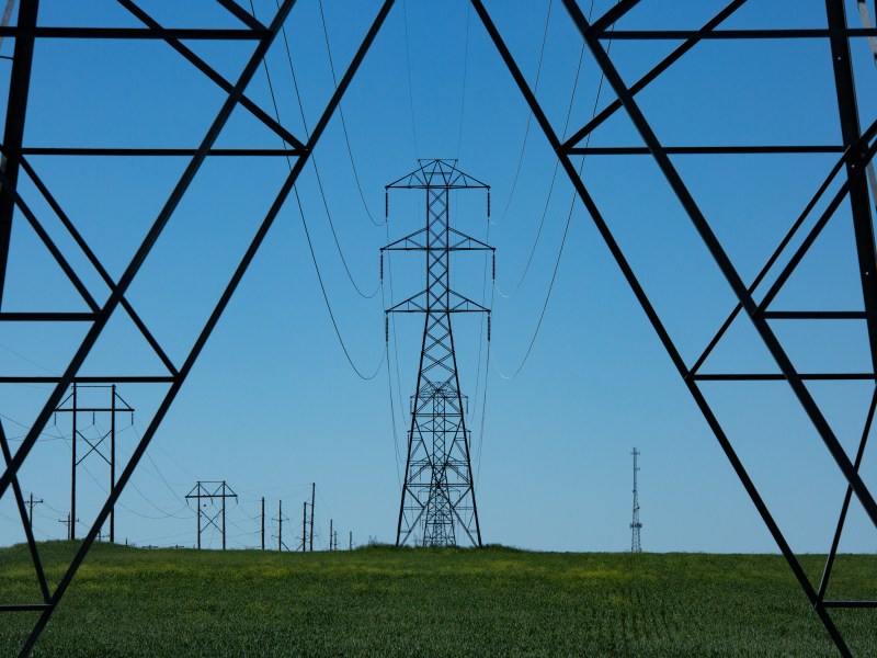 An abstract photo of towers that carry electricity