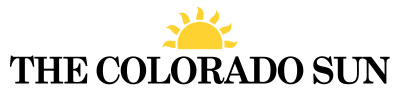 The Colorado Sun logo with a stylized yellow sun above the text "THE COLORADO SUN" in black capital letters.